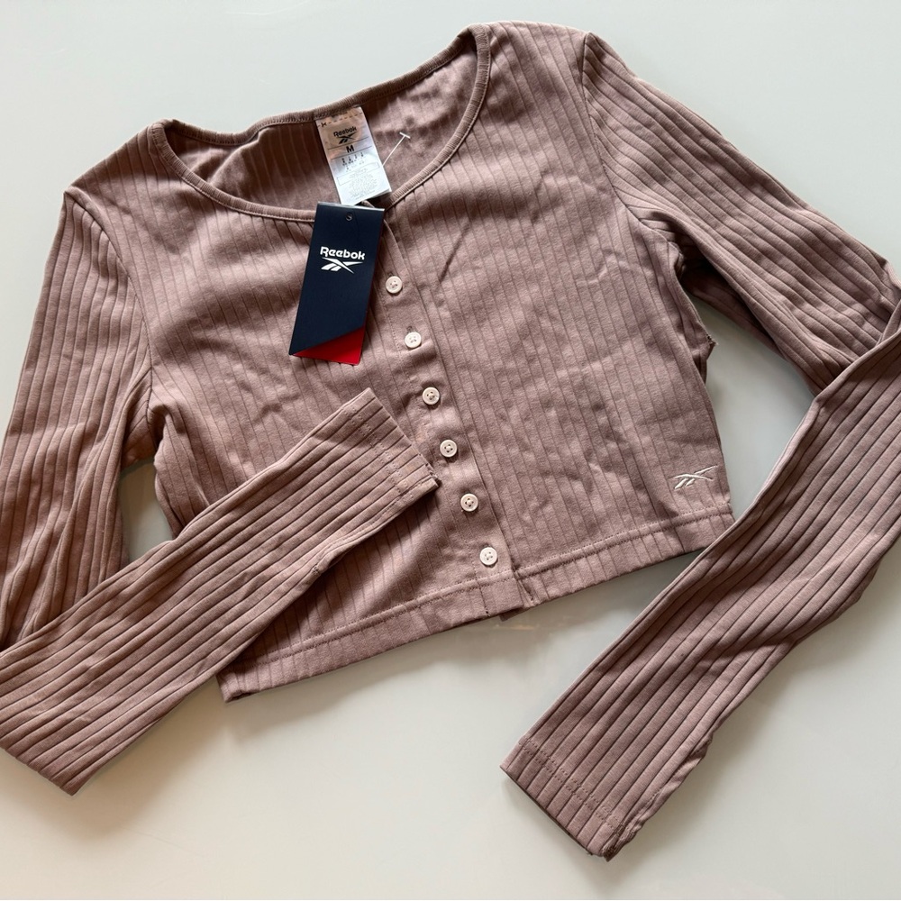 Reebok top - size M - small hole